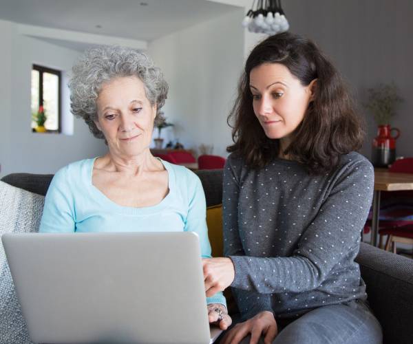 Dedicated NDIS Support Coordinator helping a participant understand their plan